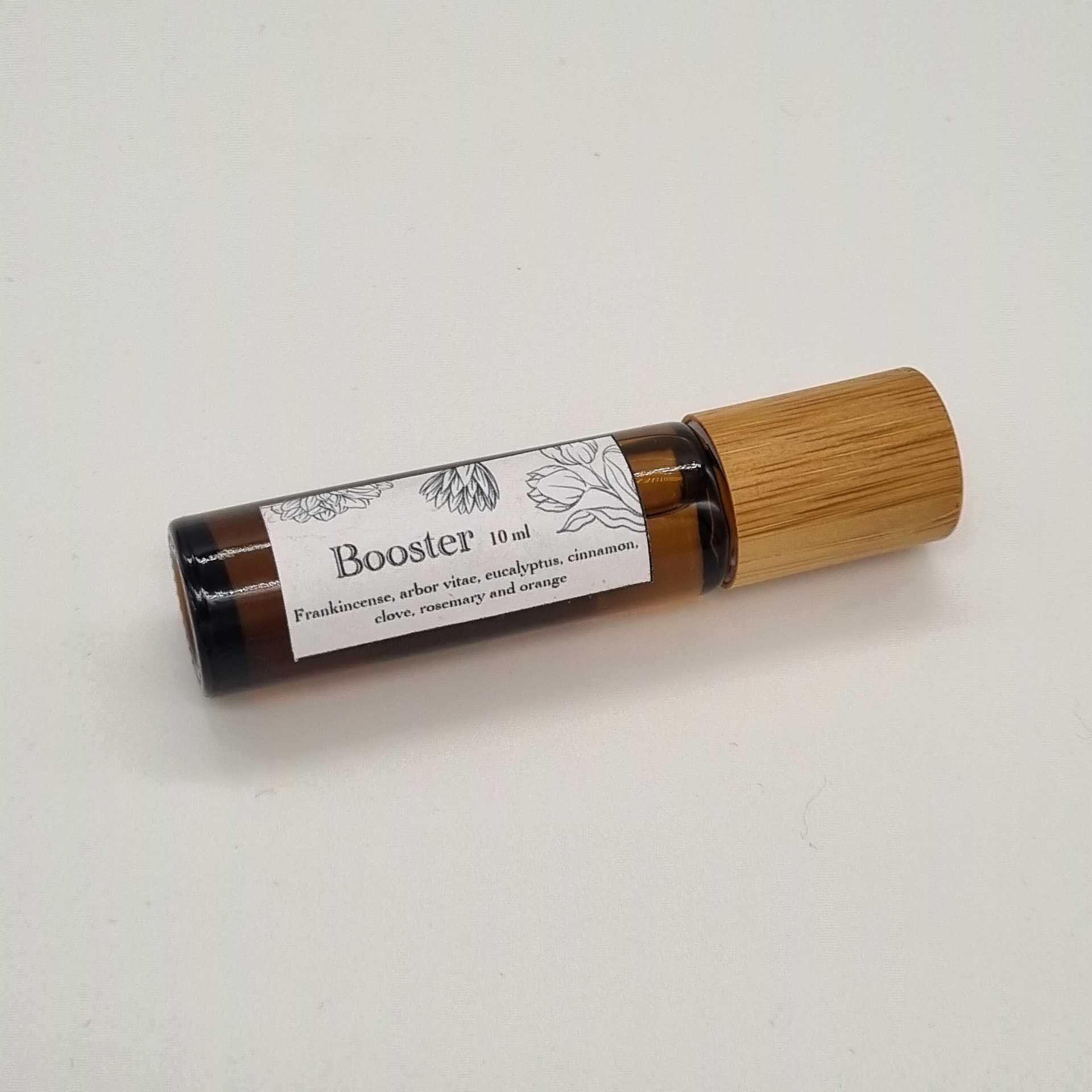 "Booster" oil blend roll on